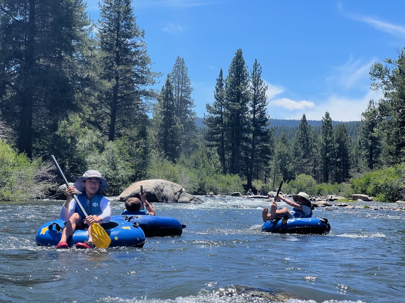 Tubes and kayaks floating down the river