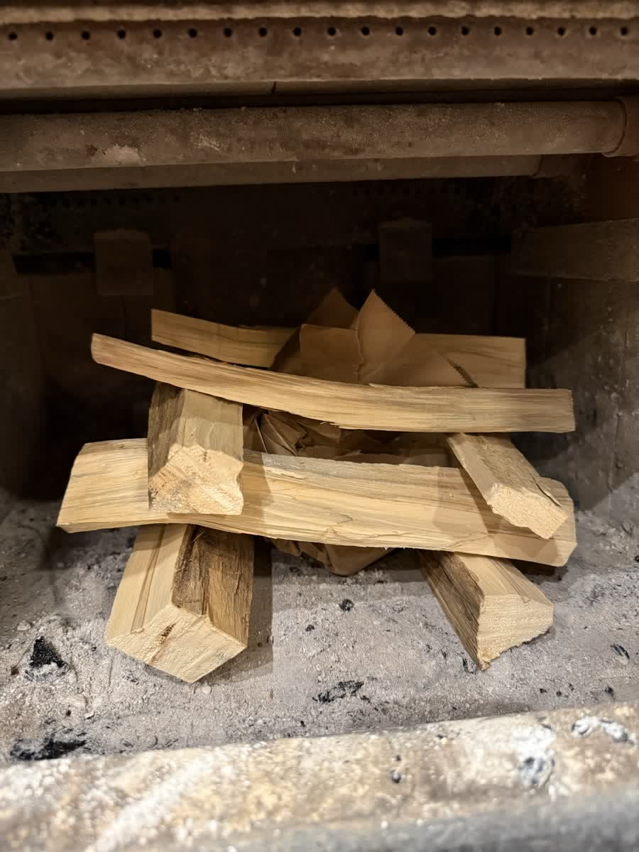 The finished log cabin with crumpled paper in the middle